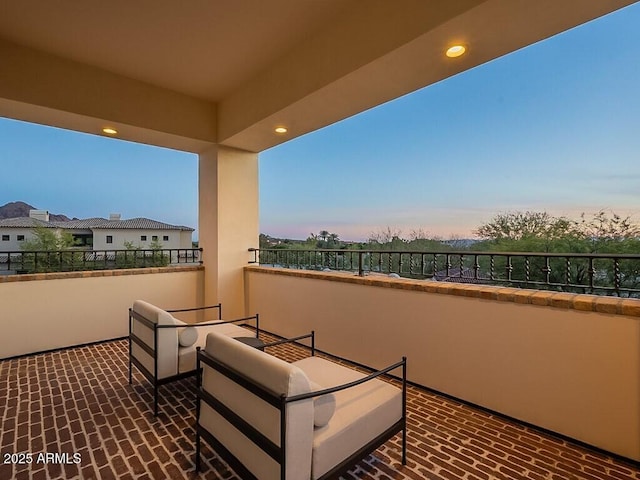 balcony featuring outdoor lounge area and a patio