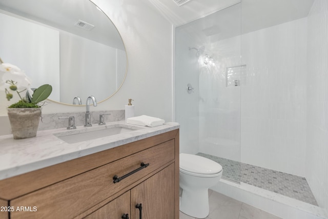 4201 E Camelback Rd Unit 70, Phoenix, AZ 85018 - full bathroom with toilet, vanity, and tiled shower