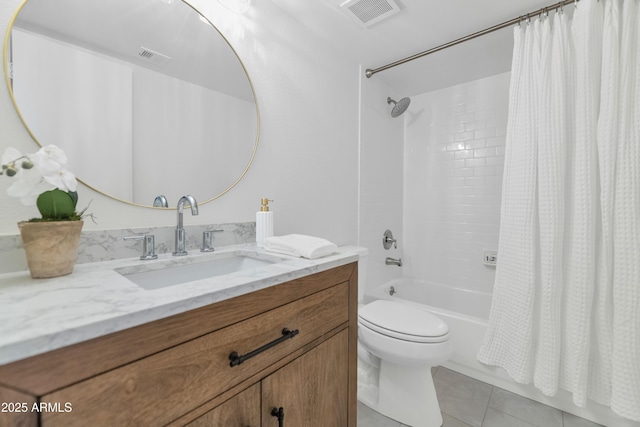 4201 E Camelback Rd Unit 70, Phoenix, AZ 85018 - bathroom featuring vanity, shower / bathtub combination with curtain, toilet, and tile patterned flooring