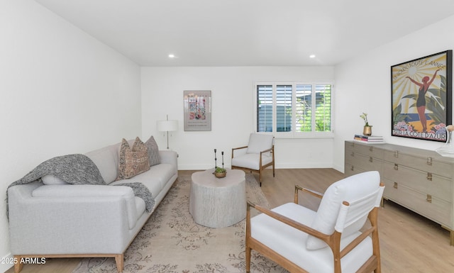 4201 E Camelback Rd Unit 70, Phoenix, AZ 85018 - living room with wood finished floors, recessed lighting, and baseboards