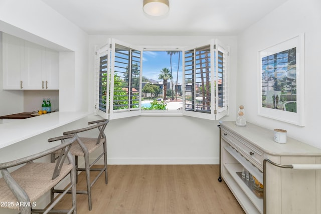 4201 E Camelback Rd Unit 70, Phoenix, AZ 85018 - home office with light wood finished floors and baseboards