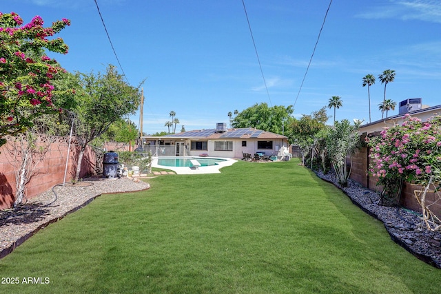 view of yard with a fenced backyard and a fenced in pool