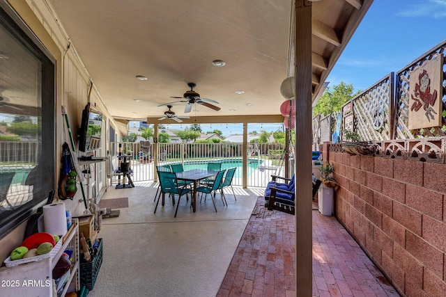 view of patio featuring a ceiling fan, a fenced in pool, and a fenced backyard
