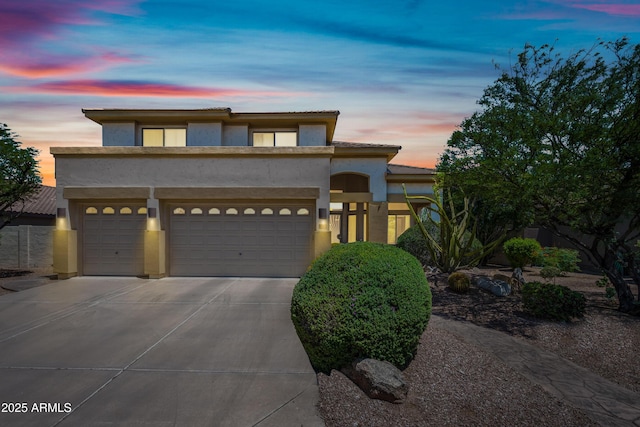 7342 E Norwood St, Mesa, AZ 85207 - view of front of home featuring stucco siding, concrete driveway, a garage, and a tile roof