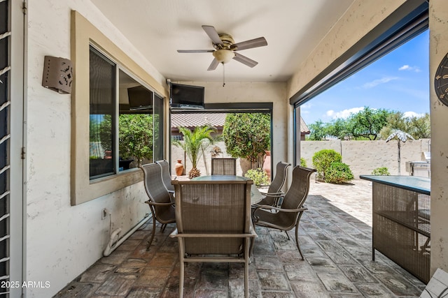 7342 E Norwood St, Mesa, AZ 85207 - fenced backyard featuring a ceiling fan, outdoor dining space, and a patio area