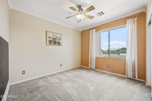 7342 E Norwood St, Mesa, AZ 85207 - spare room with ornamental molding, carpet flooring, ceiling fan, and baseboards