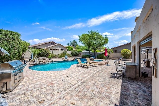 7342 E Norwood St, Mesa, AZ 85207 - view of swimming pool with an in-ground hot tub, a fenced backyard, and a patio