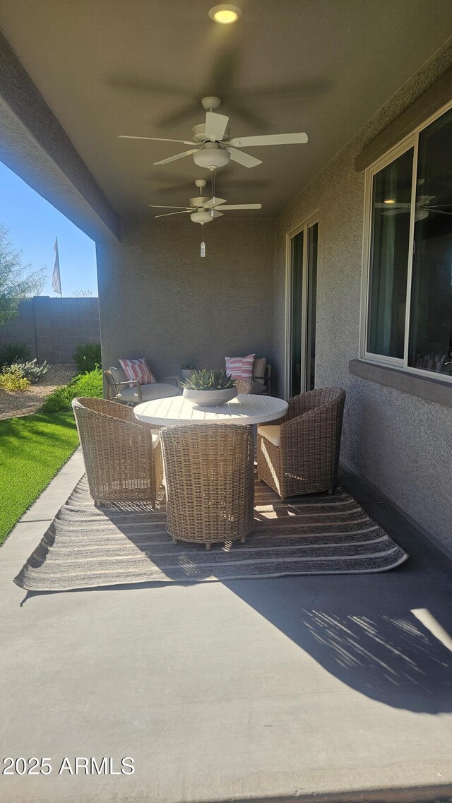 view of patio with ceiling fan