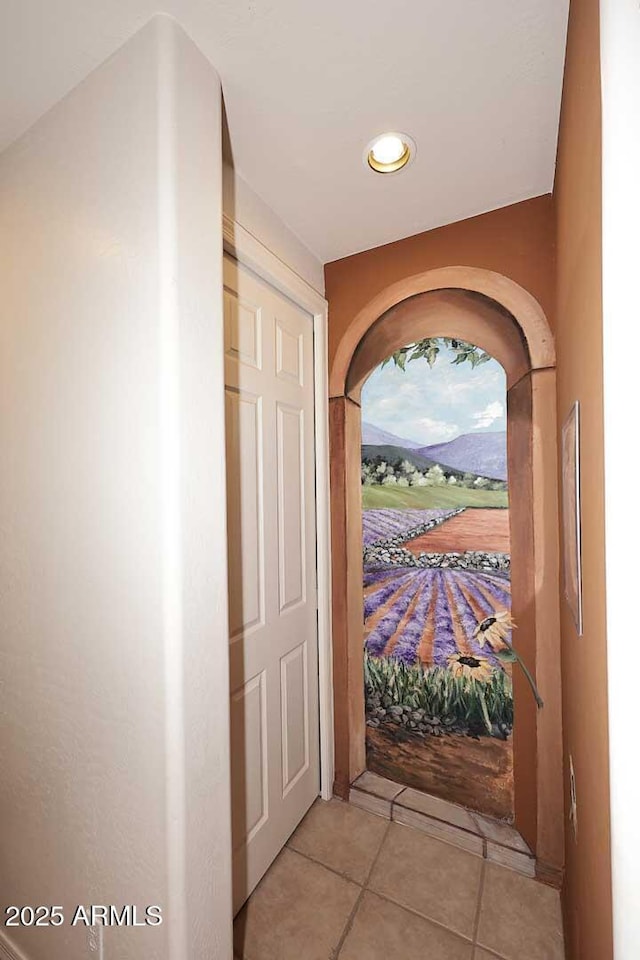 entryway featuring light tile patterned floors