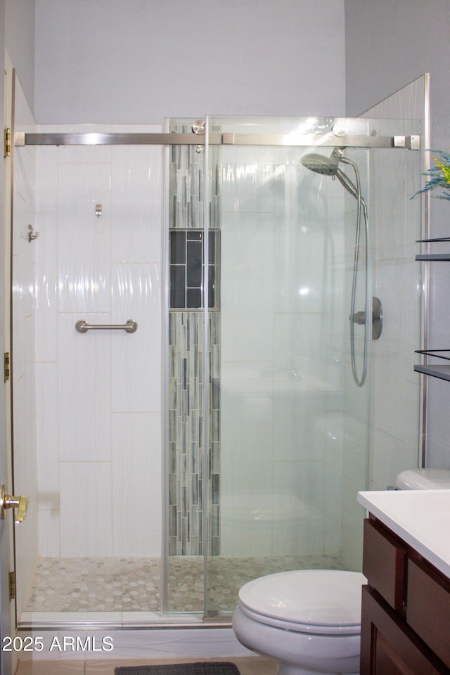 15148 W Sells Dr, Goodyear, AZ 85395 - bathroom with toilet, vanity, and a stall shower