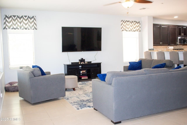 15148 W Sells Dr, Goodyear, AZ 85395 - living room with ceiling fan, light tile patterned floors, and recessed lighting
