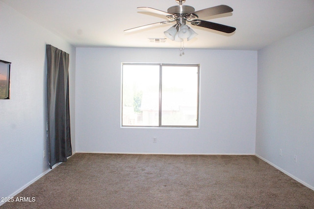 15148 W Sells Dr, Goodyear, AZ 85395 - unfurnished room featuring carpet floors, ceiling fan, and baseboards