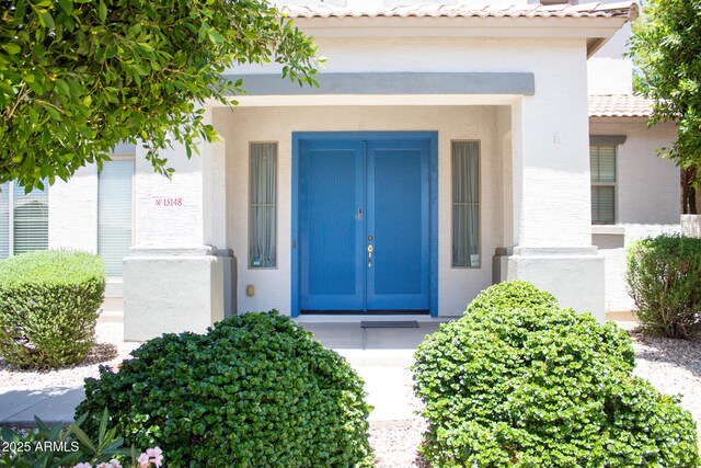 15148 W Sells Dr, Goodyear, AZ 85395 - entrance to property with french doors and stucco siding