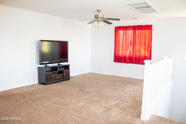 15148 W Sells Dr, Goodyear, AZ 85395 - unfurnished living room featuring carpet flooring and ceiling fan