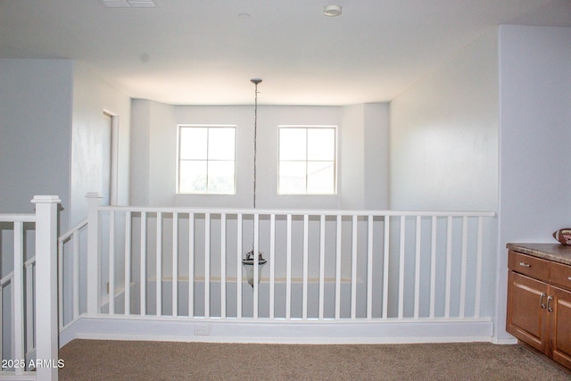 15148 W Sells Dr, Goodyear, AZ 85395 - hall featuring carpet floors and an upstairs landing