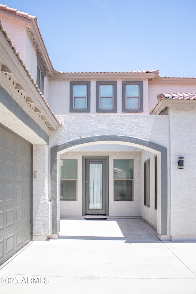 15148 W Sells Dr, Goodyear, AZ 85395 - property entrance featuring stucco siding and a tile roof