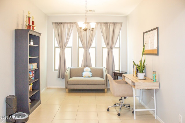15148 W Sells Dr, Goodyear, AZ 85395 - office area with a chandelier, baseboards, and tile patterned floors