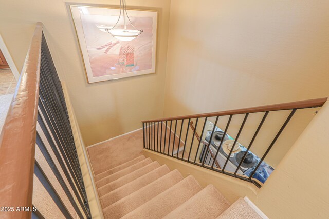 44890 W Desert Garden Rd, Maricopa, AZ 85139 - staircase featuring carpet floors and baseboards