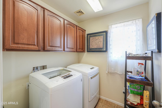 44890 W Desert Garden Rd, Maricopa, AZ 85139 - laundry room with cabinet space, washer and clothes dryer, light tile patterned flooring, and baseboards