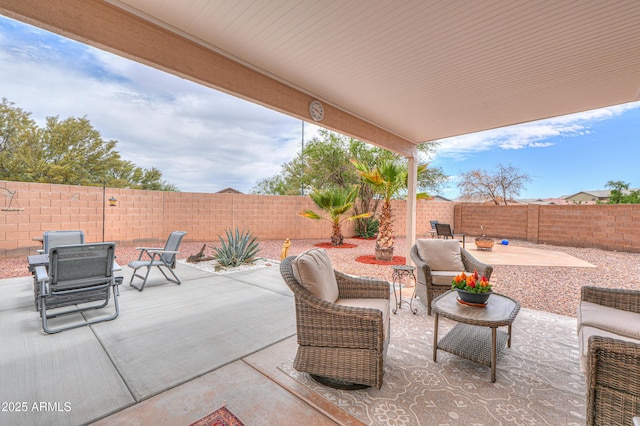 44890 W Desert Garden Rd, Maricopa, AZ 85139 - fenced backyard featuring a patio and outdoor lounge area