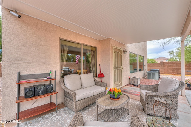 44890 W Desert Garden Rd, Maricopa, AZ 85139 - view of patio featuring an outdoor hangout area and central air condition unit