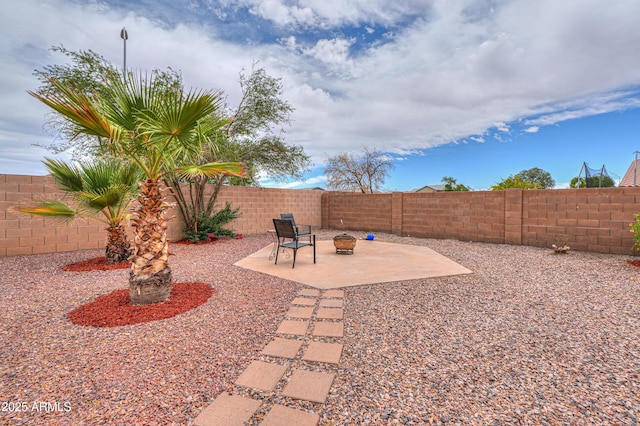 44890 W Desert Garden Rd, Maricopa, AZ 85139 - fenced backyard with a patio area