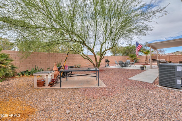 44890 W Desert Garden Rd, Maricopa, AZ 85139 - fenced backyard with central AC and a patio area