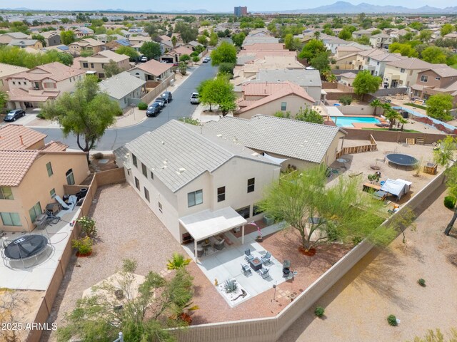 44890 W Desert Garden Rd, Maricopa, AZ 85139 - aerial view of residential area featuring a mountain backdrop and a pool