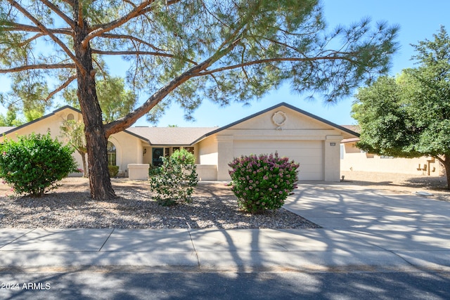 ranch-style house with a garage