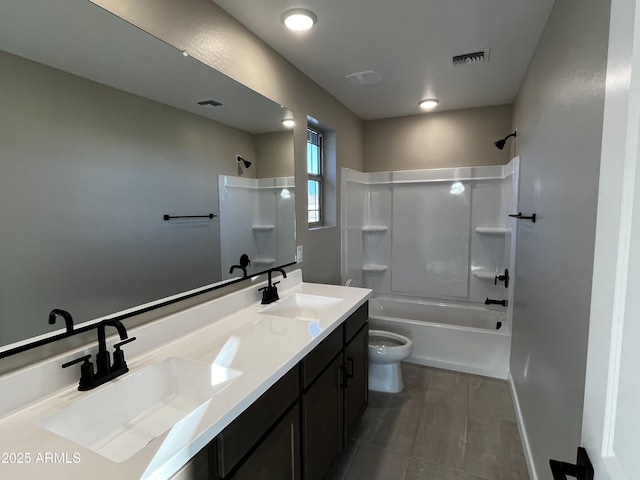 bathroom with a sink, visible vents, shower / tub combination, and toilet