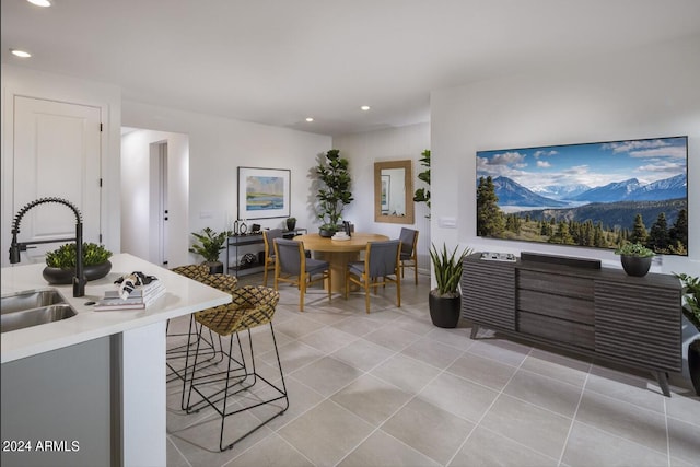 tiled living room featuring sink