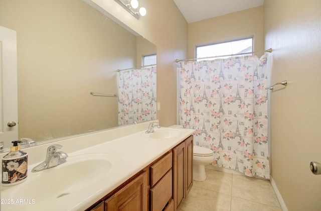 full bathroom featuring vanity, shower / bath combo, tile patterned floors, and toilet