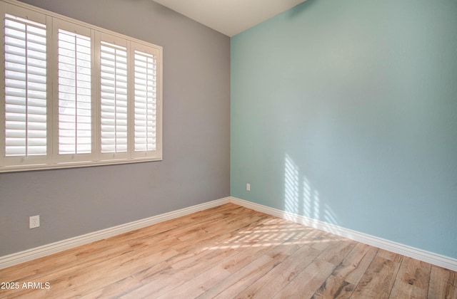 empty room featuring light hardwood / wood-style floors