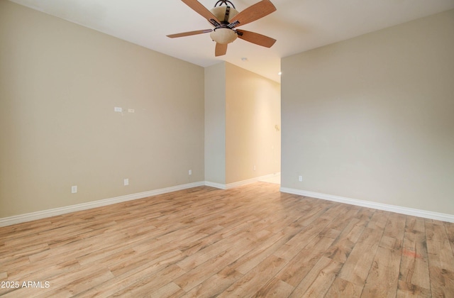 unfurnished room with ceiling fan and light wood-type flooring