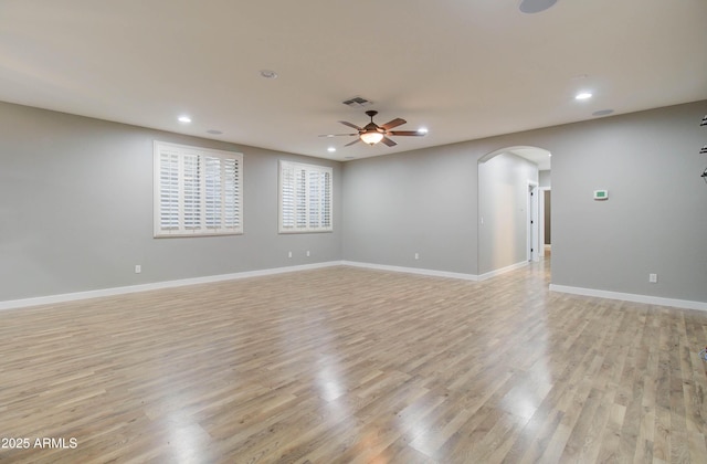 unfurnished room featuring ceiling fan and light hardwood / wood-style floors