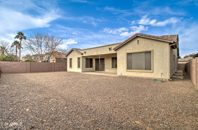 back of house featuring a patio area