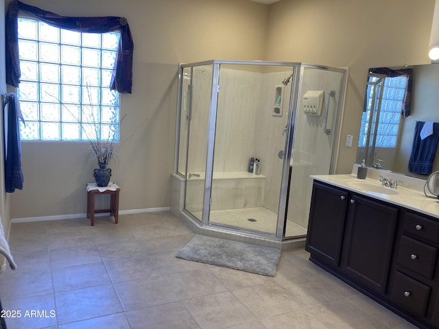 15753 W Kino Dr, Surprise, AZ 85374 - full bath with a stall shower, vanity, tile patterned floors, and baseboards