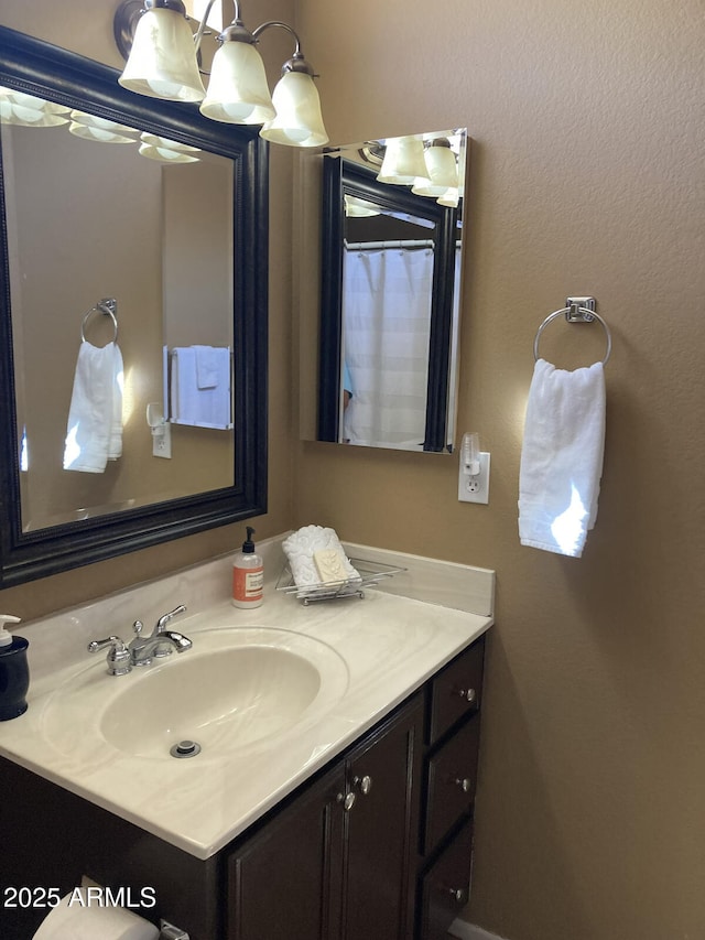 15753 W Kino Dr, Surprise, AZ 85374 - bathroom with vanity and a chandelier