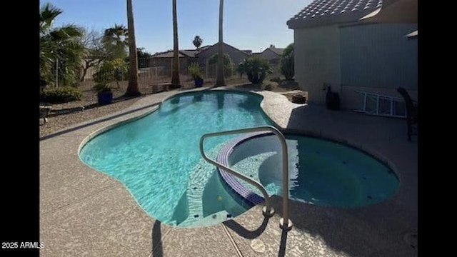 15753 W Kino Dr, Surprise, AZ 85374 - view of swimming pool featuring a patio and a hot tub