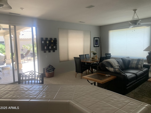 15753 W Kino Dr, Surprise, AZ 85374 - carpeted living area with a ceiling fan