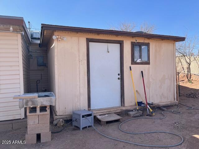 view of outbuilding with an outbuilding