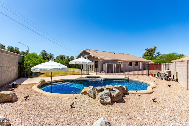 723 N Joshua Tree Ln, Gilbert, AZ 85234 - view of swimming pool with a fenced backyard, a patio area, and a pool with connected hot tub