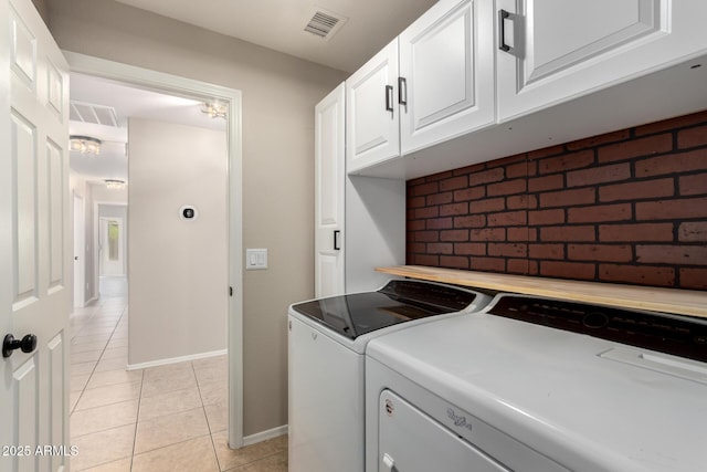 723 N Joshua Tree Ln, Gilbert, AZ 85234 - washroom with washer and clothes dryer, light tile patterned flooring, and cabinet space