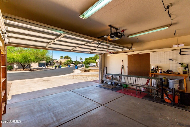 723 N Joshua Tree Ln, Gilbert, AZ 85234 - garage featuring a garage door opener