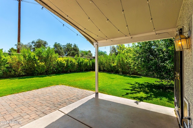 723 N Joshua Tree Ln, Gilbert, AZ 85234 - fenced backyard with a patio area
