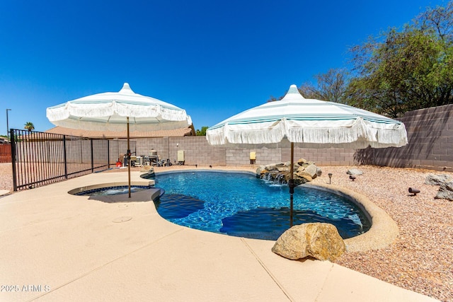 723 N Joshua Tree Ln, Gilbert, AZ 85234 - view of pool with a fenced backyard, a patio area, and a pool with connected hot tub