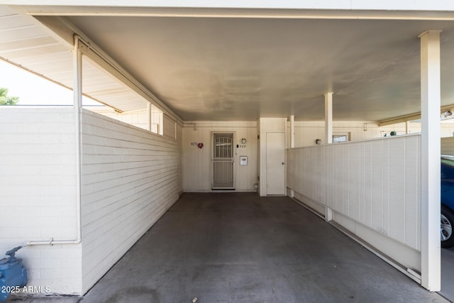 entrance to property featuring a carport