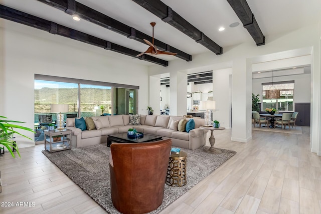 living room with beamed ceiling