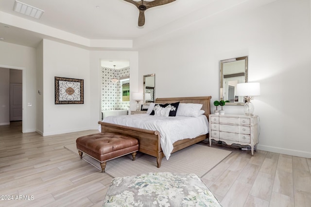 bedroom featuring ceiling fan and light hardwood / wood-style floors