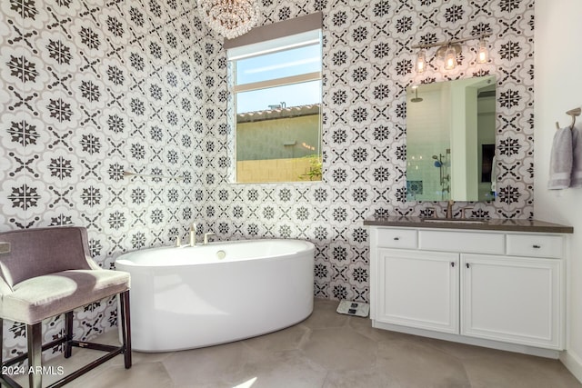 bathroom featuring vanity and a bathing tub